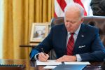 President Joe Biden signs two