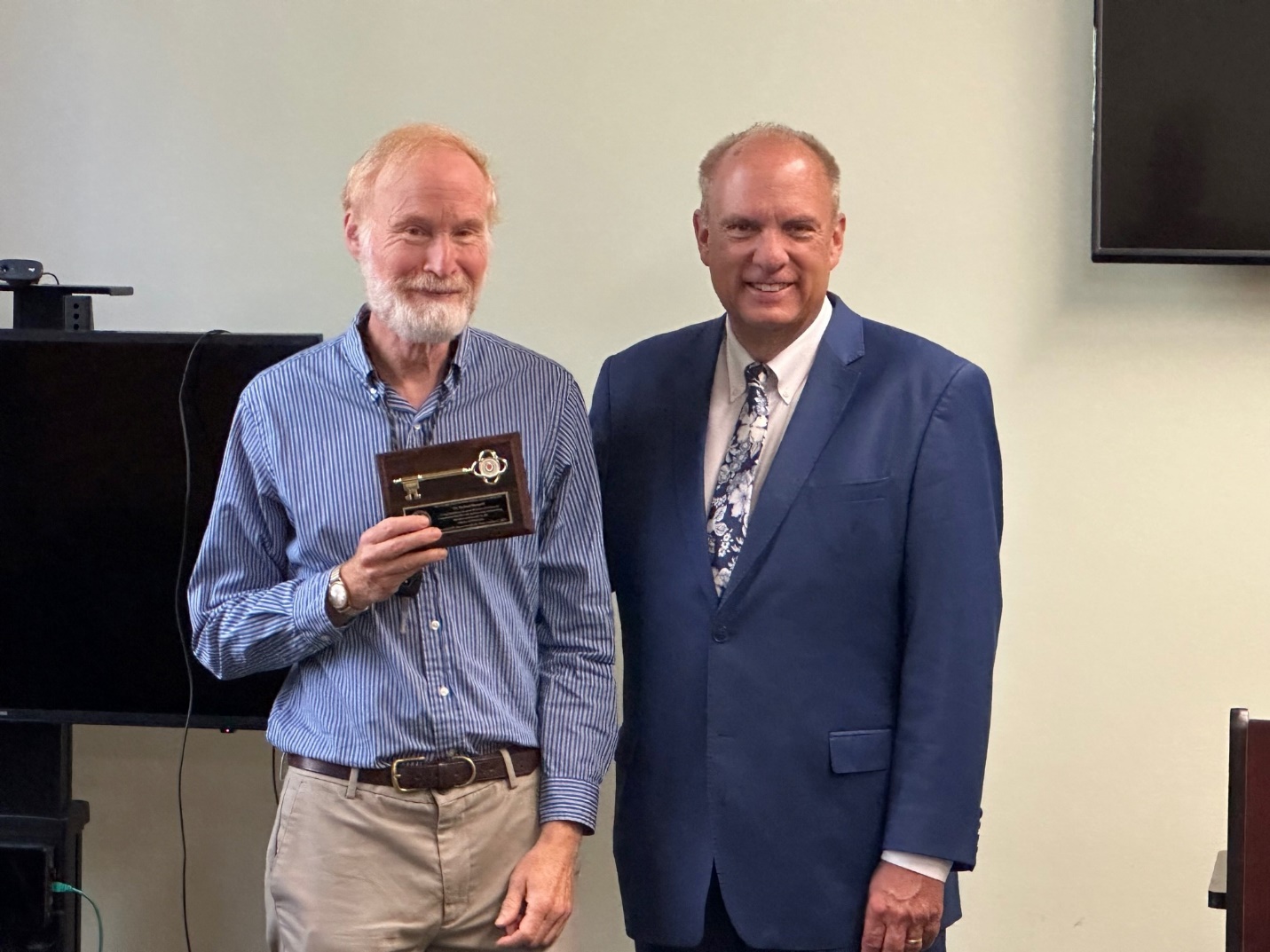 Dr. Richard Hummel (left) received a key to the City of Worcester from Mayor Joe Petty (right) recognizing 40 years of mental health for the City’s youth. From soccer to drums, he meets the youth where they gather. (Courtesy Photo/UMass Memorial Health)