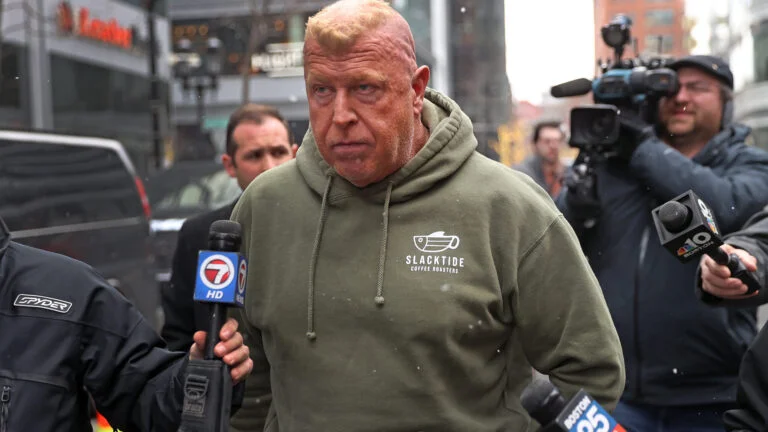 Gary Cederquist, head of the state police CDL licensing unit, after his federal court appearance in Boston. (Photo credit: David L. Ryan/Boston Globe)