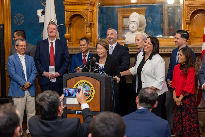 Massachusetts Governor Maura Healey at podium in State House announcing Gateway City housing development project. (Photo: Mass.gov)