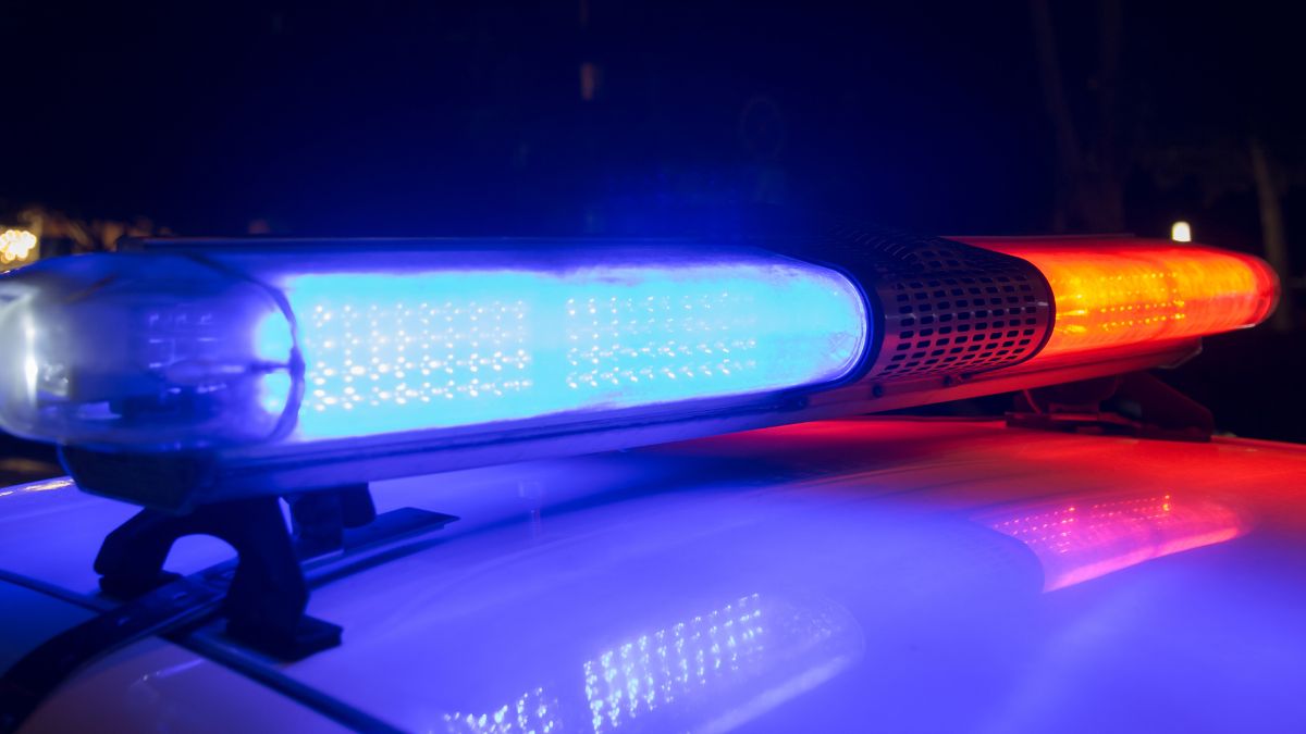 A stock photo of a close up of police cruiser headlights.