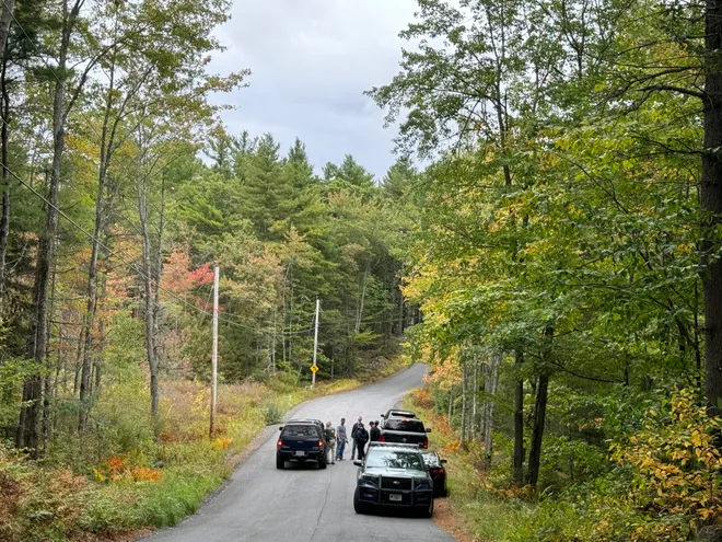 Massachusetts State Police deployed drones near Kelton Street in Gardner on Monday in search of Aaron Pennington, the man accused of killing his wife in October 2023. Despite extensive efforts, his whereabouts remain unknown.