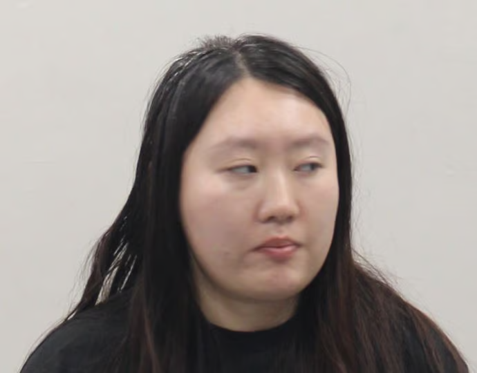 This is a photo of Yuxin Fu, a 24-year-old from Flushing, New York, who was arrested for allegedly defrauding a Marstons Mills resident of $46,000. (Photo courtesy of Barnstable Police Department)