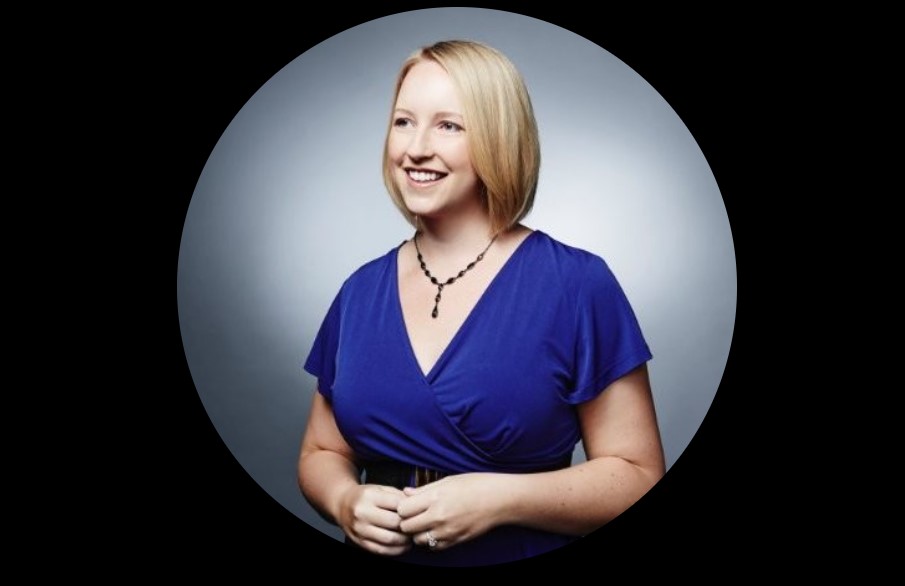 Jacqui Smith's LinkedIn profile picture. She's a heavyset blonde woman in a blue dress.