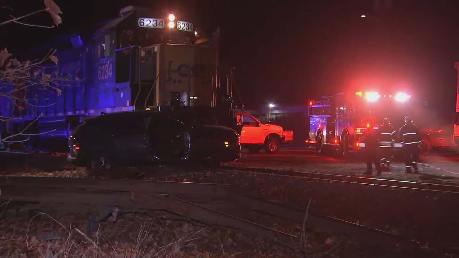 A photo showing the scene of Thursday night's collision between a car and a CSX freight train in Leominster. (Photo Credit: Boston25News)