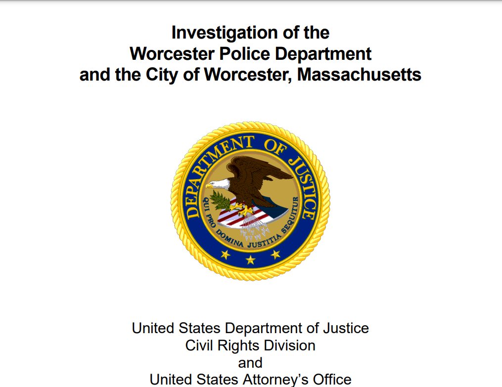 A picture of the front page of the DOJ's report with the circular emblem in the center with a bald eagle inside of it
