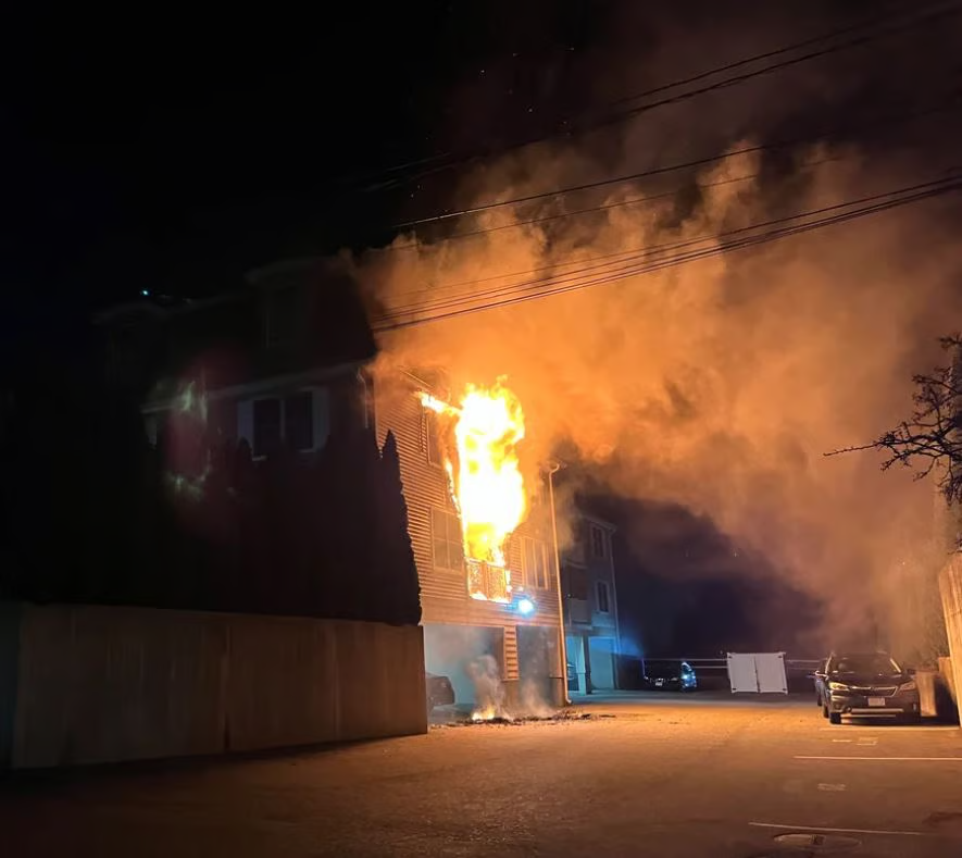 A photo of 3 Pirmi Lane in Gloucester, engulfed in flames on the evening of Dec. 14, 2024. (Photo Credit: Gloucester Fire Department)