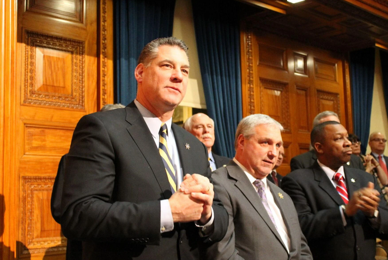 Middlesex County Sheriff Peter Koutoujian standing confidently, representing his recent appointment to the MBTA Board as a public safety expert.