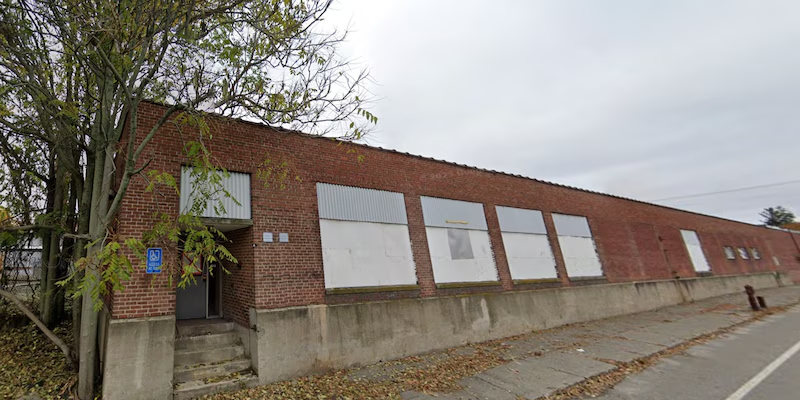 The abandoned warehouse at 830-894 Main St. in Clinton, formerly housing Continental Cabinetry & Plumbing Supply, is slated for demolition to make way for new commercial developments, including Starbucks and Wendy's.