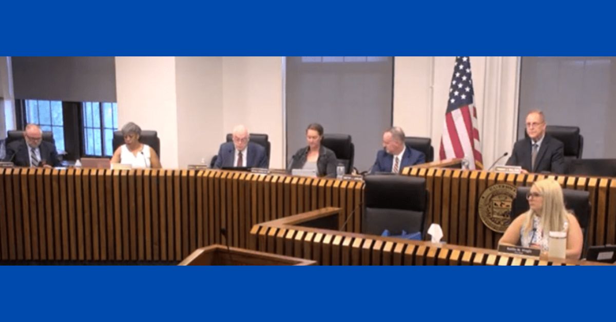 Haverhill City Council members seated behind a wood-paneled dais during the June 3, 2025, meeting at City Hall, with the American flag in the background. Screenshot from HC Media.